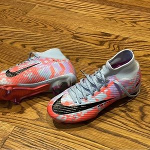 Women’s Nike cleats- New! Worn one time.Size 6.5, equals youth size 5.5.